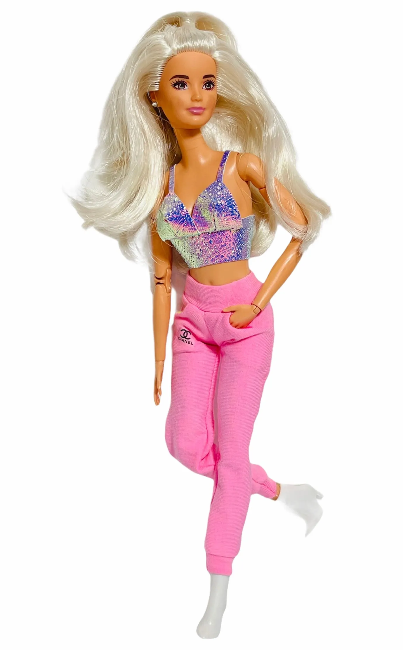 Pink sweatpants for Barbie dolls with pockets