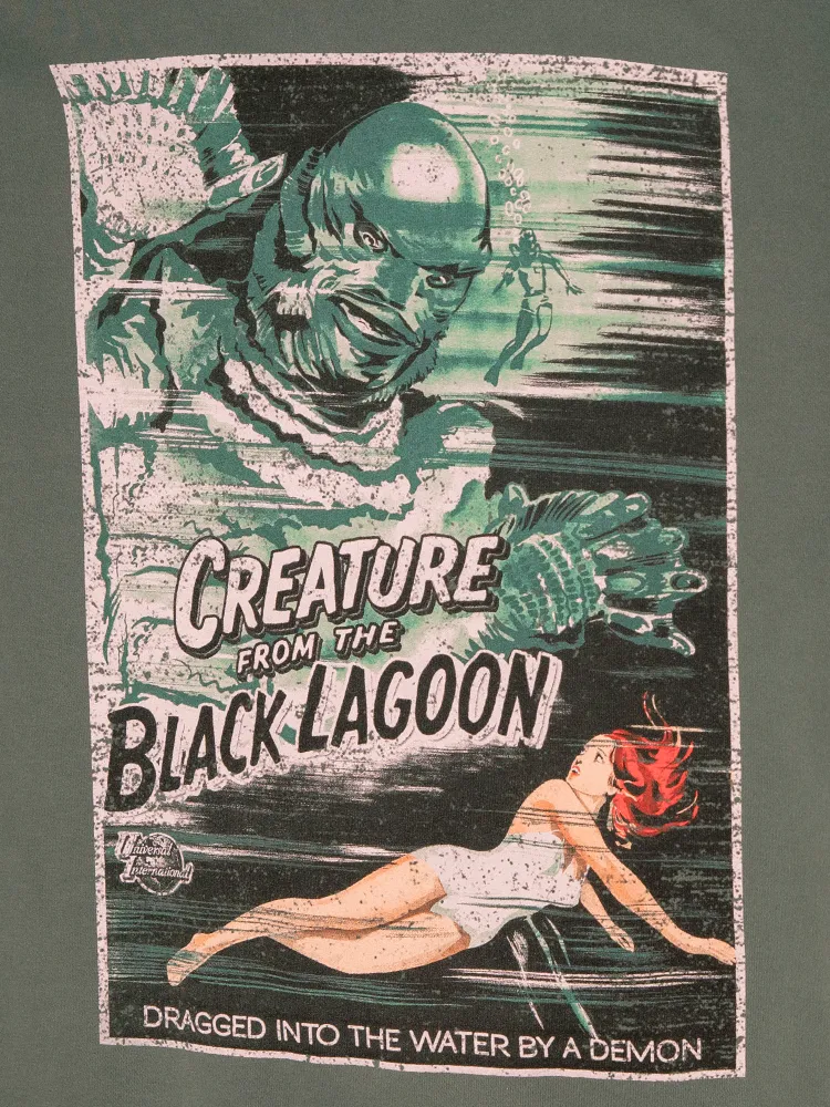 Universal Monsters: Creature from the Black Lagoon Movie Poster Sweatshirt in Vintage Green (unisex)